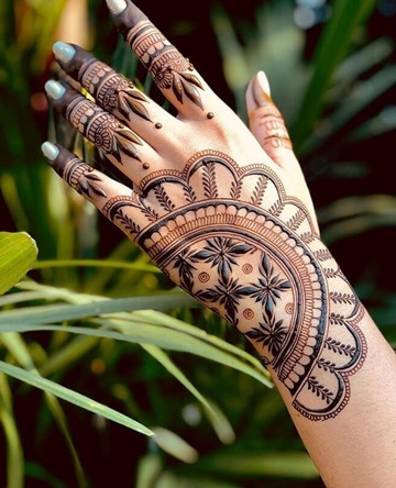 Unique Back Hand Mehndi Design